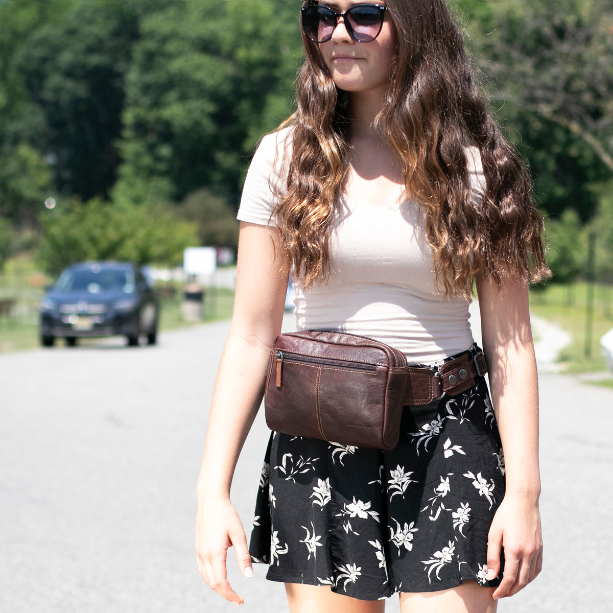 Jack Georges Voyager Brown Large Travel Belt Bag #7109 (Female Model Lifestyle - Front Left Side - park)